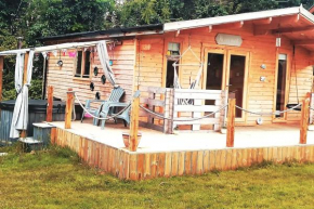 Luxury log cabin with wood fired hot tub